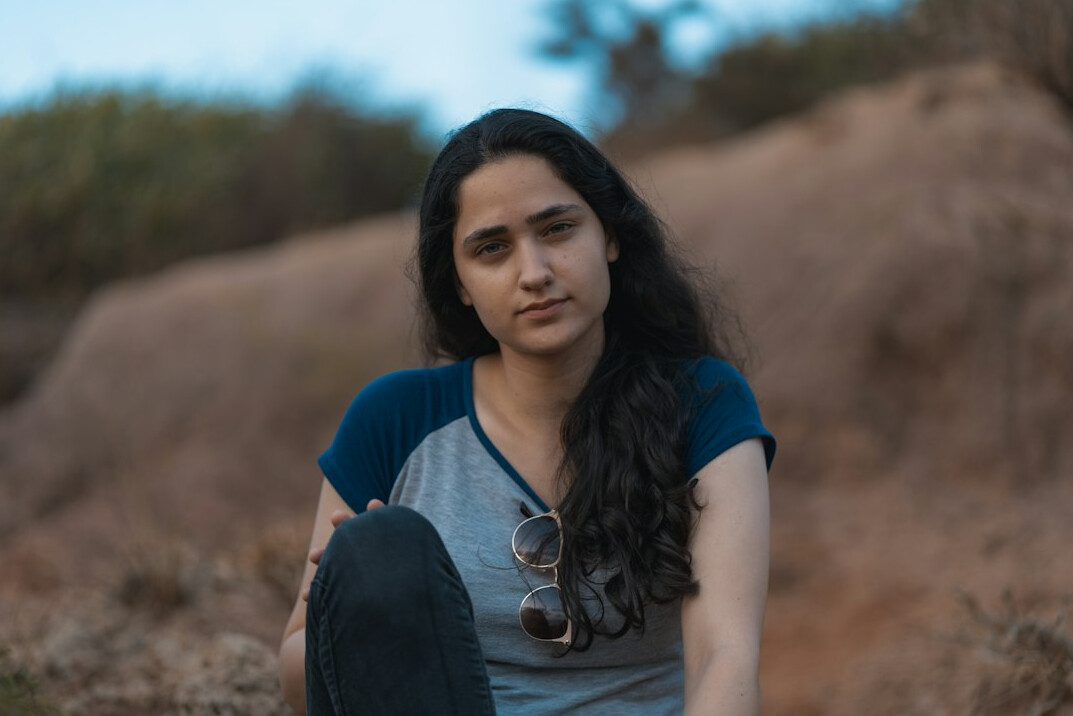 Portrait of a young Hispanic woman fiction editor