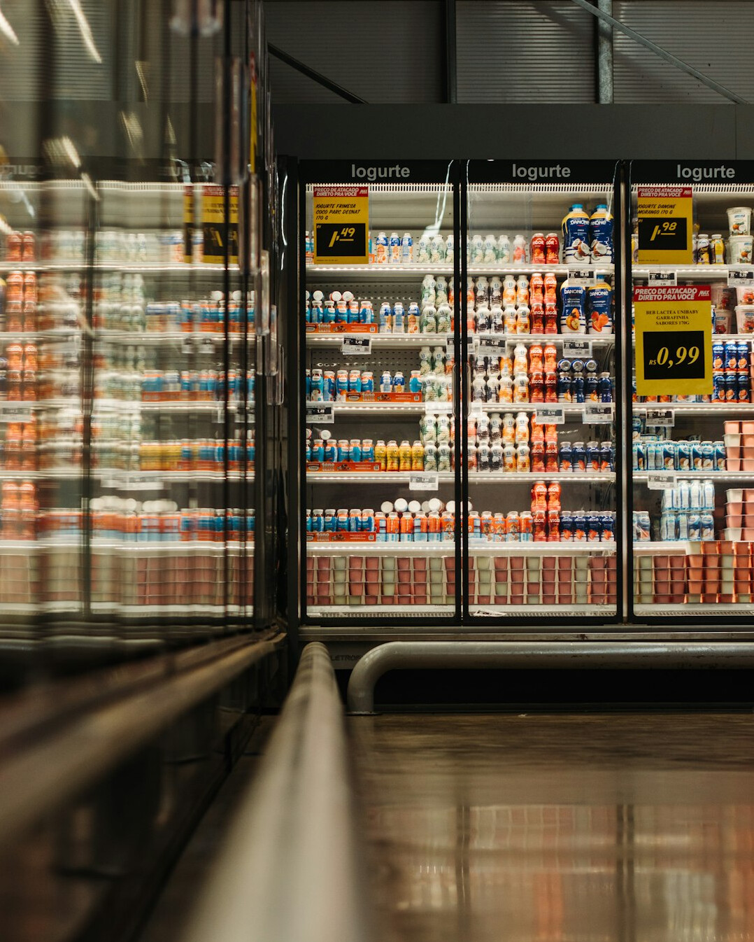 man shopping in supermarket aisle